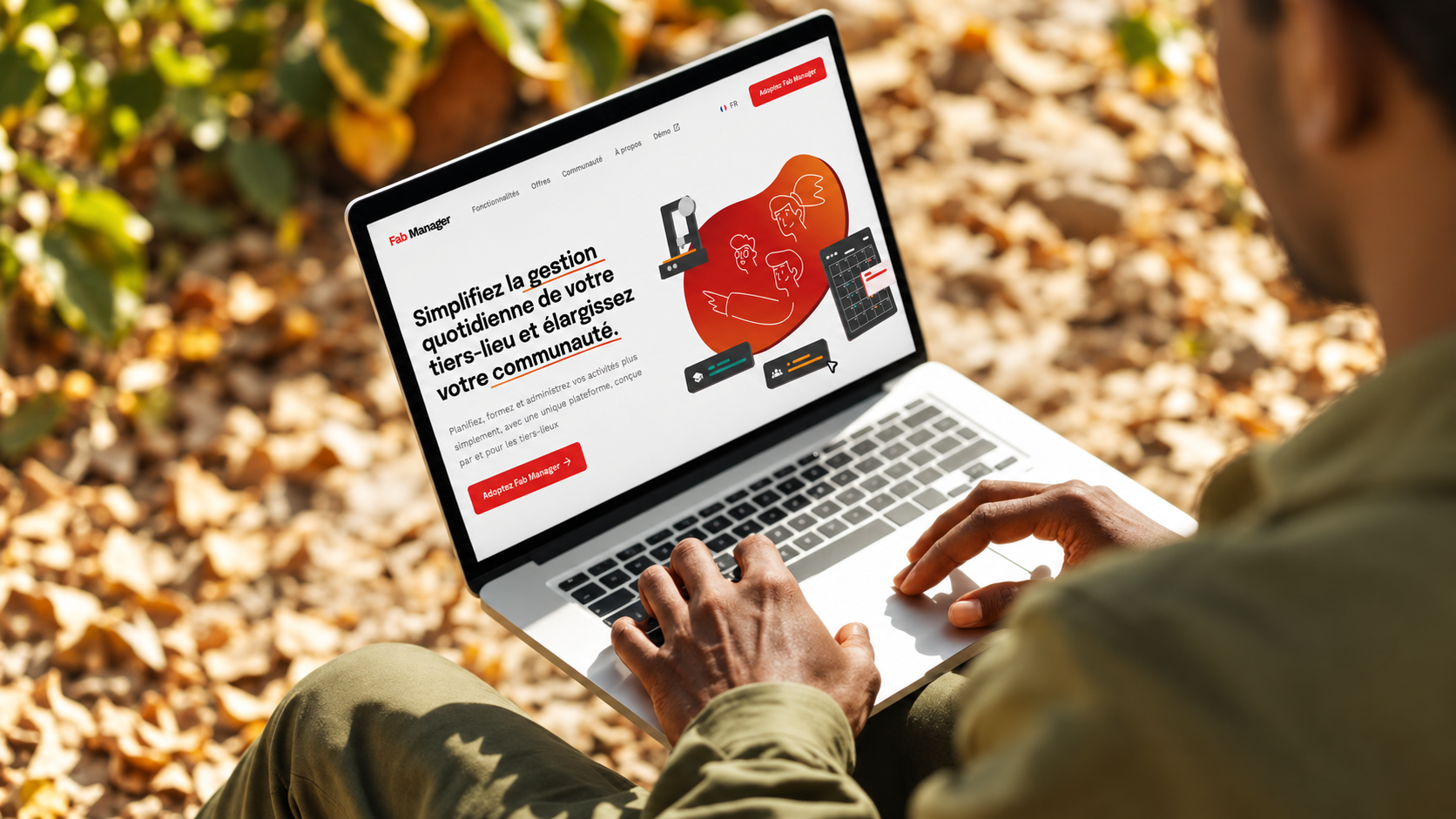 Page d’accueil de Fab Manager affichée sur un ordinateur portable utilisé en extérieur